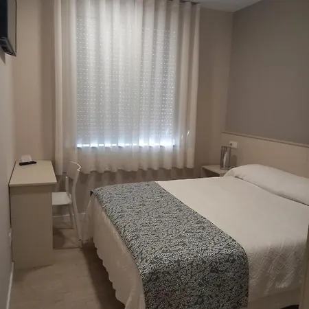 La Puerta De *